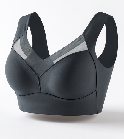 Black sports bra with gray mesh panels on a white background